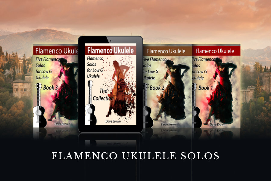 4 books against a background of the Alhambra in the distance