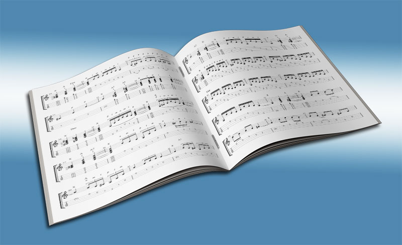 image showing open book with view if music